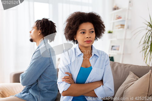 Image of unhappy couple having argument at home