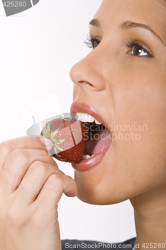 Image of Bitting into a strawberry