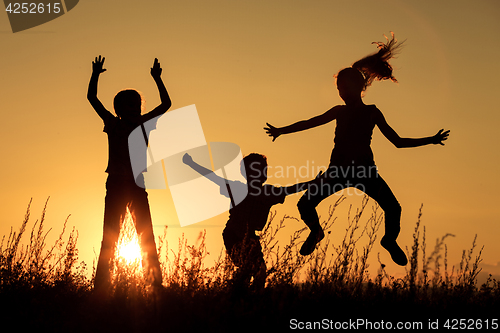 Image of Happy children playing in the park.