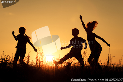 Image of Happy children playing in the park.