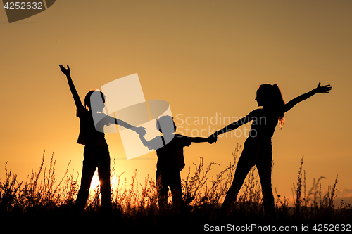 Image of Happy children playing in the park.