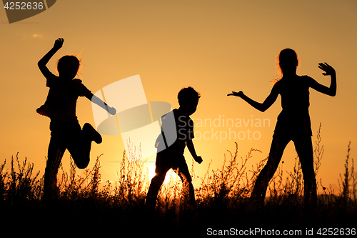 Image of Happy children playing in the park.