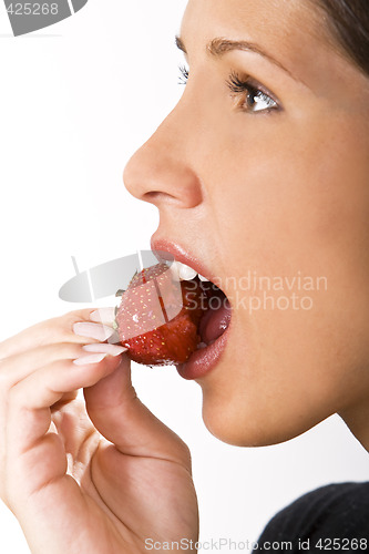 Image of Bitting into a strawberry