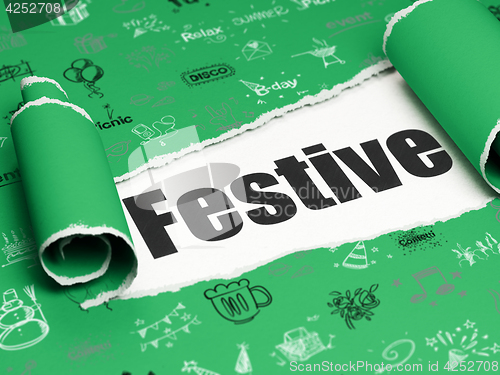 Image of Holiday concept: black text Festive under the piece of  torn paper