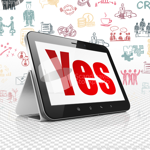Image of Business concept: Tablet Computer with Yes on display