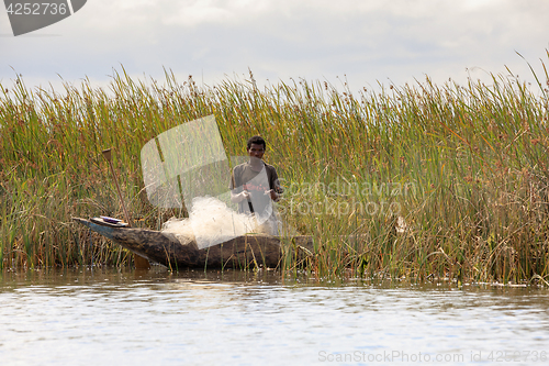 Image of Fisherman life in madagascar countryside on river