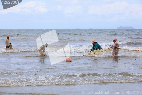 Image of Native Malagasy fishermen fishing on sea, Madagascar