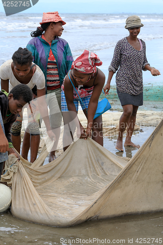 Image of Native Malagasy fishermen fishing on sea, Madagascar