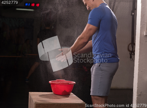 Image of Gym Chalk Magnesium Carbonate hands clapping man