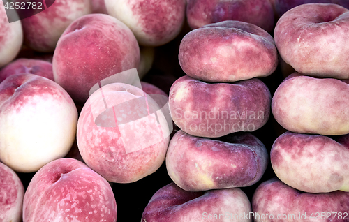 Image of Tasty fruits - ripe peaches.