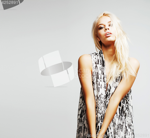 Image of young pretty woman with blond hair on white background, sensual 