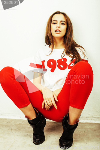 Image of young pretty teenage hipster girl posing emotional happy smiling on white background, lifestyle people concept closeup