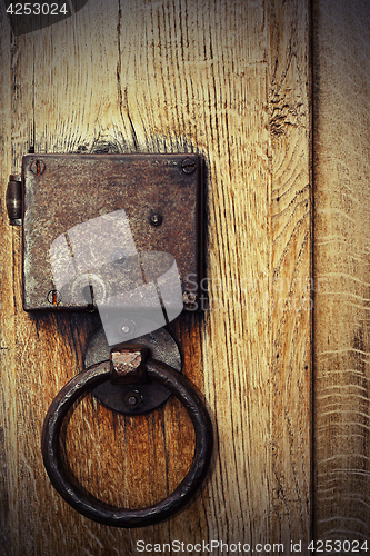 Image of detail of old wood gate