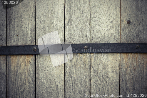 Image of detail on oak wooden door