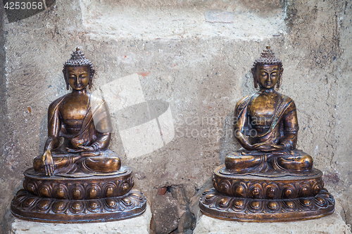 Image of Meditating Buddha Statues couple