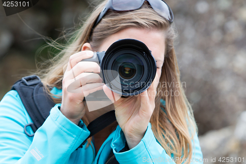 Image of Close up of a female photographer