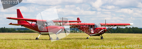 Image of two airplane on the ground