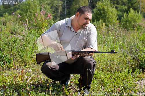 Image of cleaning of rifles