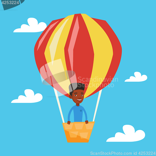 Image of Man flying in hot air balloon vector illustration.