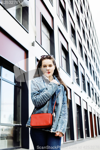 Image of young pretty hipster girl student with coffee cup posing adorable smiling, lifestyle people concept outdoor