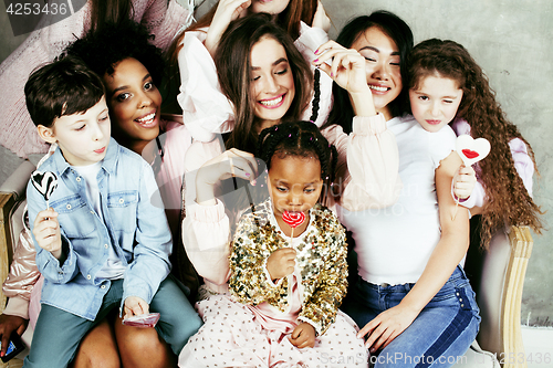 Image of Lifestyle and people concept: young pretty diversity nations woman with different age children celebrating on birth day party together happy smiling, making selfie. African-american, asian and caucasi