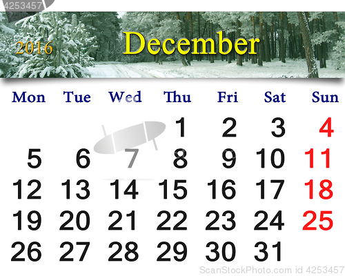 Image of calendar for December 2016 with picture of winter forest