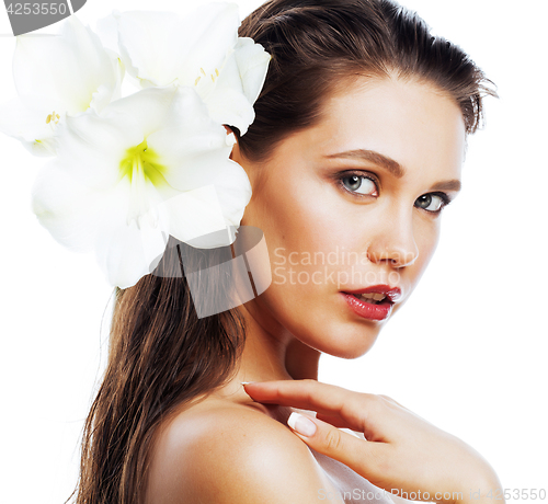 Image of young pretty woman with  Amarilis flower close up isolated on wh