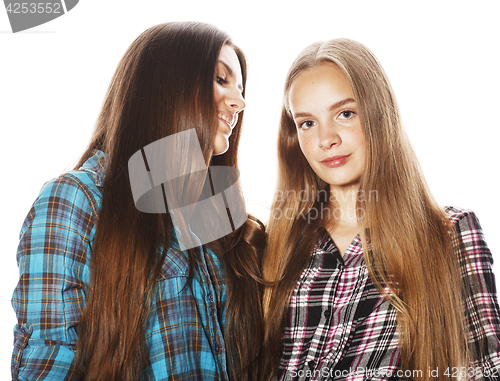 Image of two cute teenagers having fun together isolated on white