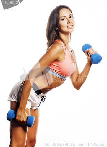 Image of young pretty slim woman with dumbbell isolated