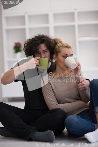 Image of young couple in their new home