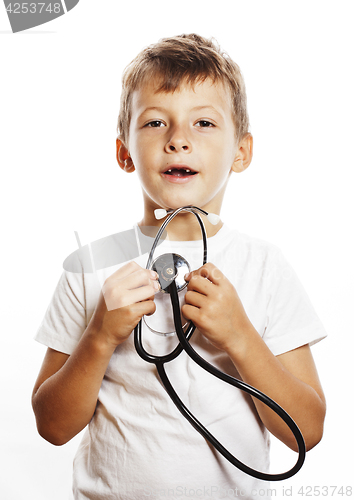 Image of little cute boy with stethoscope playing like adult profession d