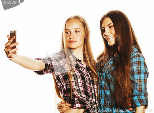 Image of cute teenage girls making selfie isolated