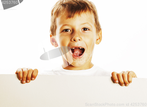 Image of little cute boy holding empty shit to copyspace isolated close u