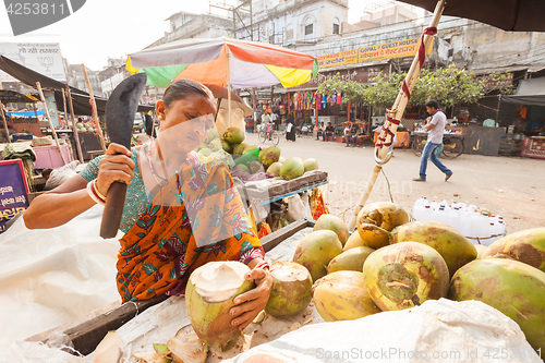 Image of Coconut milk seller