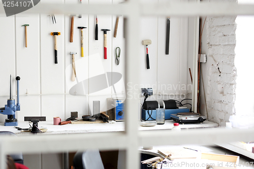 Image of Craft workshop , tools hanging on the wall