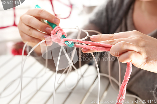 Image of Crocheting. Hand needlework. Needlework.