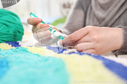 Image of Crocheting. Hand needlework.