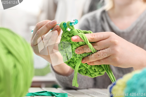 Image of Crocheting. Hand needlework. Needlework.