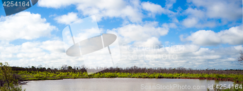 Image of Ranch Pond Green Grass Blue Shy White Clouds