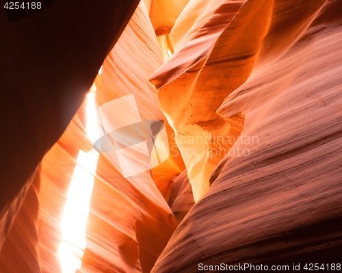 Image of Sunlight Beams Through Crevasse Sandstone Rock Antelope Slot Can