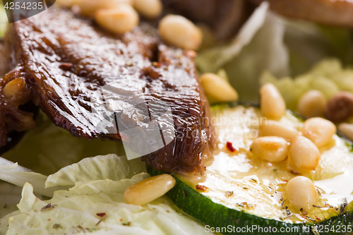 Image of salad with meat. grilled beef tongue