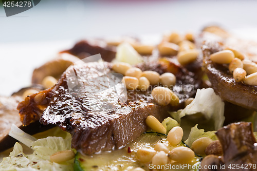 Image of salad with meat. grilled beef tongue