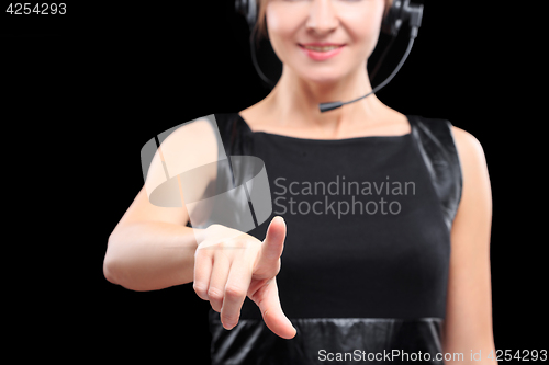 Image of Businesswoman pressing high tech type of modern buttons on a virtual keyboard