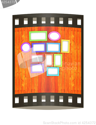 Image of Mock up picture frames on wood wall. 3d illustration. The film s