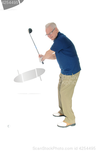 Image of Senior practicing golf at home.