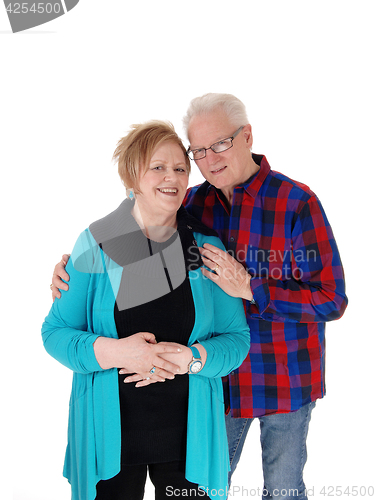 Image of Lovely senior couple hugging.