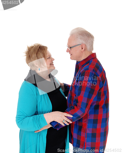 Image of Senior couple looking at each other.