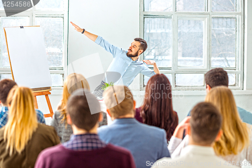 Image of Speaker at Business Meeting in the conference hall.