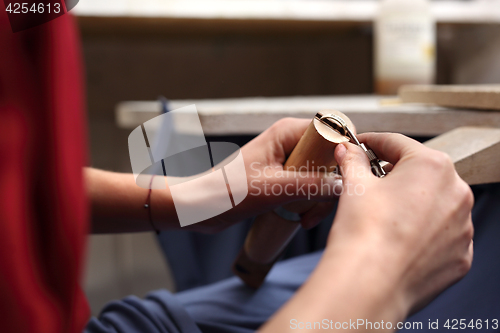 Image of Manually creating jewelry. Jeweler.