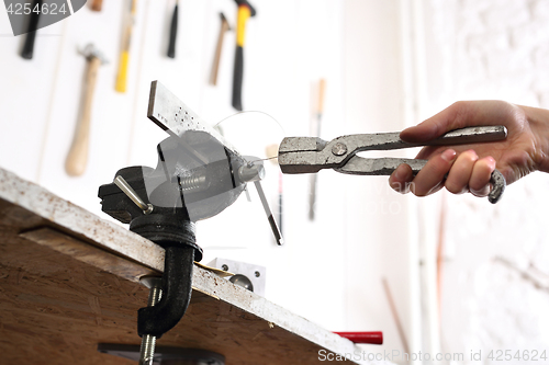 Image of Creating artistic jewelery. Jeweler at work.